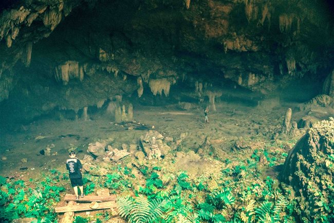 Stalactites and stalagmites in a big cave in Van Trinh Commune