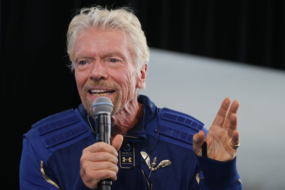 Billionaire entrepreneur Richard Branson wears his astronaut's wings at a news conference, after flying with a crew in Virgin Galactic's passenger rocket plane VSS Unity to the edge of space at Spaceport America near Truth or Consequences, New Mexico, U.S., July 11, 2021. 