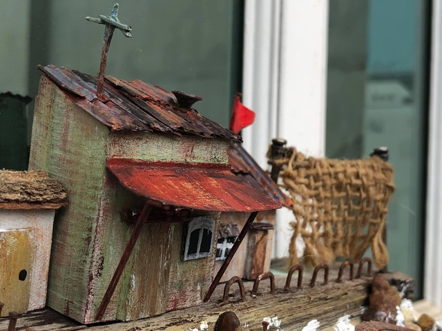 One of Trần Minh Tân's houses made from waste wood collected from workshops and factories. 