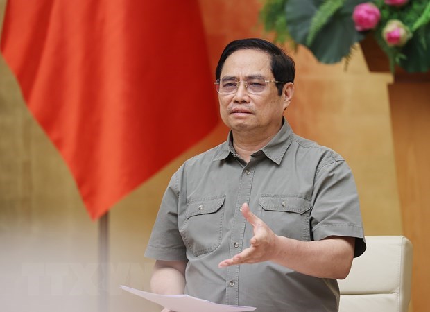 Prime Minister Pham Minh Chinh addresses the meeting of the National Steering Committee for COVID-19 Prevention and Control on September 11.