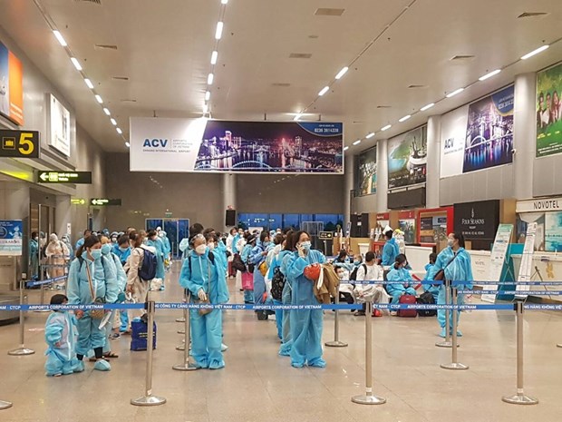 A total of close to 200 natives of Quang Nam are brought back to their hometown from HCM City on a Vietnam Airlines flight. (Photo: Vietnam Airlines)