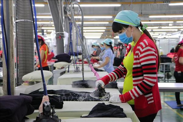 Production at Eclat Vietnam factory (Photo: VNA)