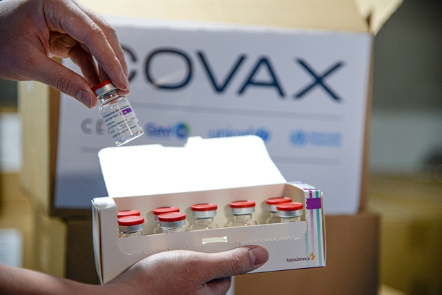 A box containing AstraZeneca COVID-19 vaccine vials arriving in Việt Nam from COVAX. — Photo courtesy of the World Health Organisation in Việt Nam