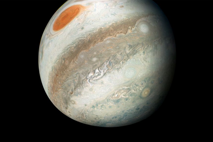 The Great Red Spot is a storm roughly 16,000km wide churning in Jupiter's southern hemisphere, boasting crimson-coloured clouds that spin counterclockwise at high speeds.