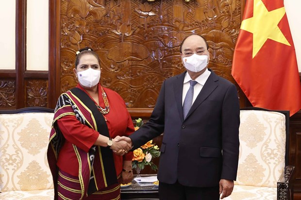 President Nguyen Xuan Phuc (R) and Timor-Leste Ambassador Olandina Isabel Caeiro Alves.