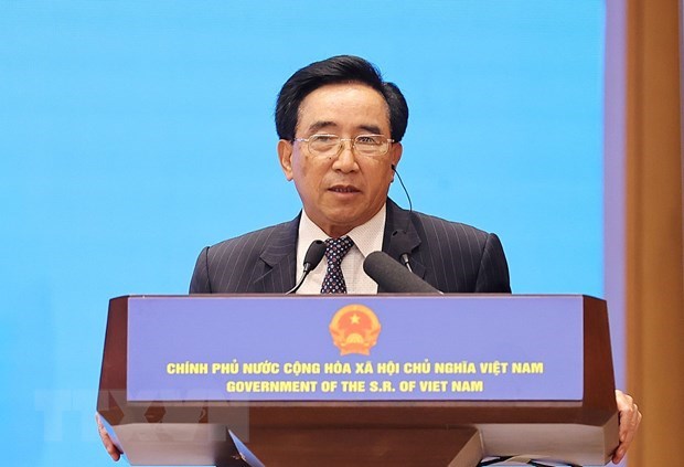 Lao Prime Minister Phankham Viphavanh at a meeting with businesses.