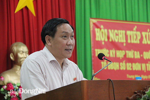Đại biểu Bùi Xuân Thống phát biểu tại buổi tiếp xúc cử tri ở xã Trung Hòa, H.Trảng Bom. Ảnh: Trần Danh