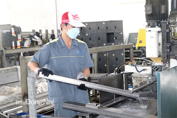 Công ty hữu hạn Công nghiệp Boss ở Khu công nghiệp Sông Mây (H.Trảng Bom) sản xuất linh kiện máy móc xuất khẩu sang Nhật Bản, Hoa Kỳ. Ảnh: Hương Giang