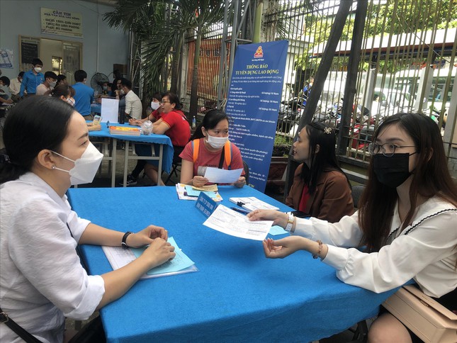 Firms looking for employees at a job fair in HCM City's Binh Thanh District in May 2022