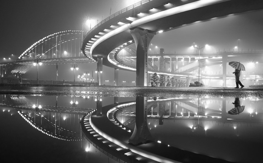 DYPA Gold Medal: Brushes of the Bridge by Giang Son Dong (Vietnam). The second edition of the photo contest is hoped to leave a cultural imprint amid activities marking Da Lat 130th anniversary. 