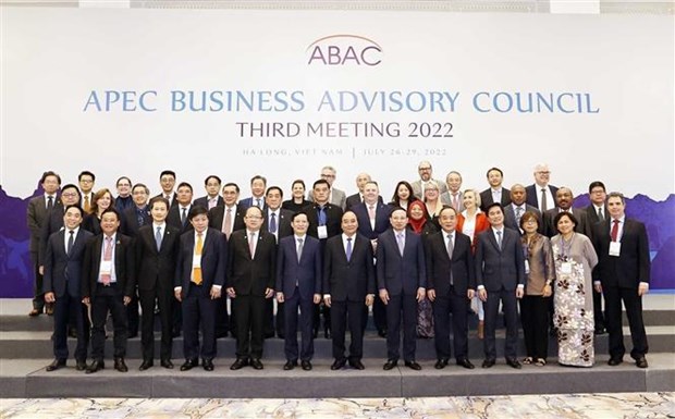 Delegates at the meeting pose for a group photo. 