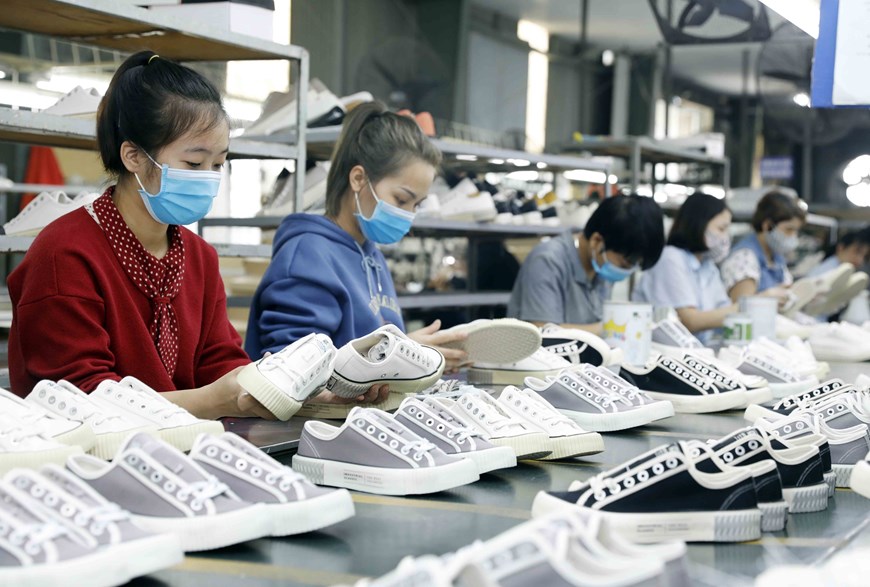 Female workers at a factory. Impressive import-export value helps Vietnam rank 22nd in terms of export turnover and capacity and 26th in international trade. 