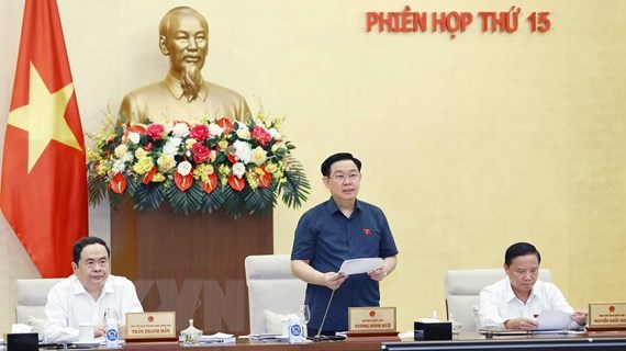 NA Chairman Vuong Dinh Hue (centre) delivers the opening speech of the NA Standing Committee's 15th meeting on September 12. 