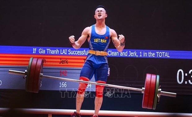 Lai Gia Thanh brought home a gold for a combined lift of 262kg in the men's 55kg category. (Photo: VNA)