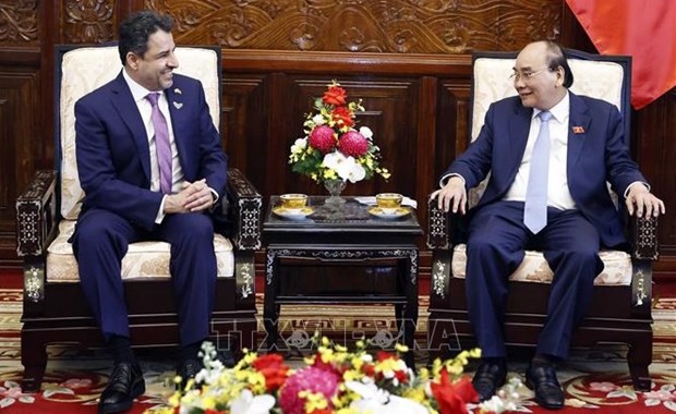 President Nguyen Xuan Phuc (R) receives UAE Ambassador to Vietnam Obaid Saeed Al Dhaheri. 