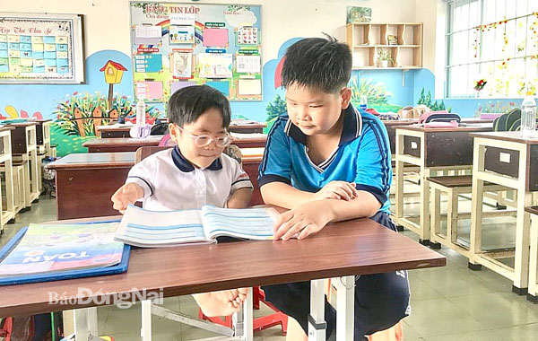 Em Phùng Quang Huy, người bạn thân thiết luôn đồng hành với Thiên Ân từ khi là học sinh lớp 1. Ảnh: M.Dũng