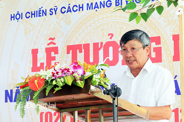 Phó bí thư thường trực Tỉnh ủy Hồ Thanh Sơn phát biểu tại lễ tưởng niệm. Ảnh: Nga Sơn