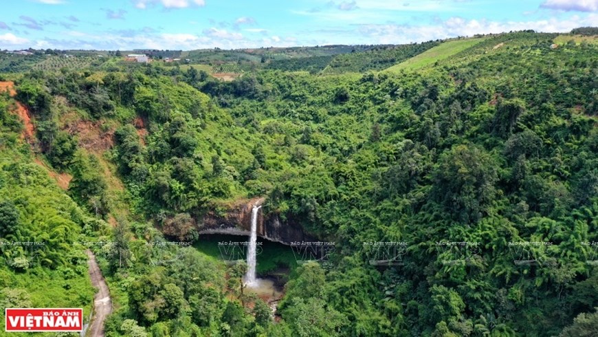 The waterfall cascades down from a 30-metre-tall cliff and appears like a white silk thread from a distance. 