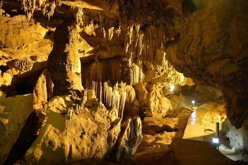 Stalactites and stalagmites form magical shapes in Nguom Ngao Cave. 